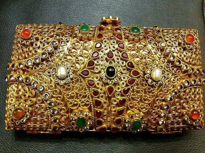 Gold plated clutch.