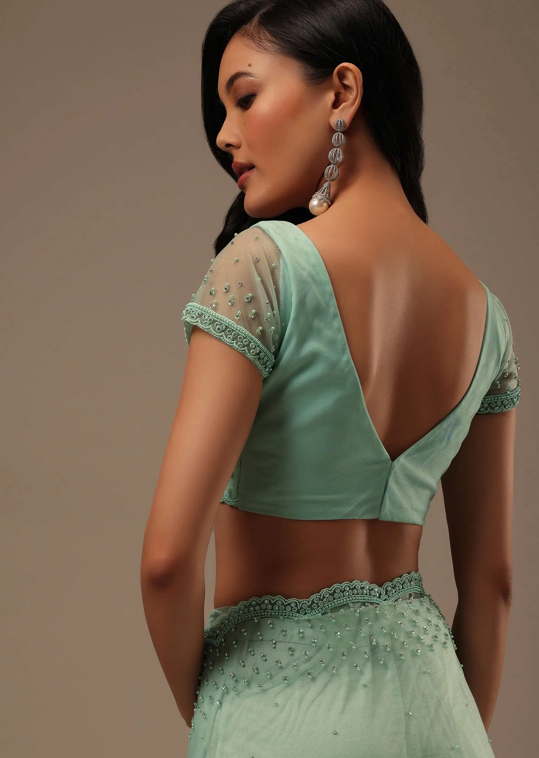 Light Green Stone And Beads Embellished Net Saree