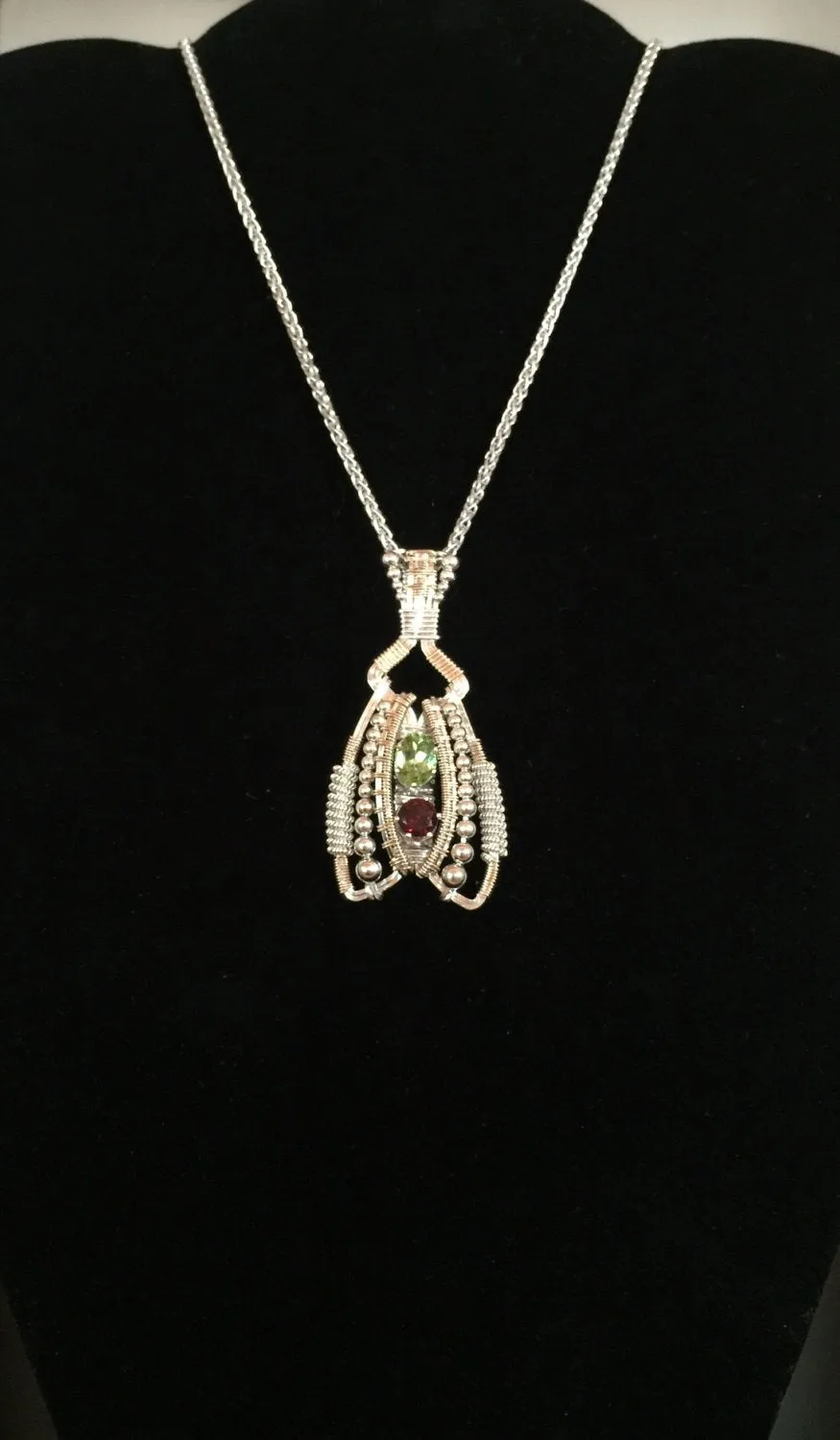 Peridot and Garnet Coiled Amulet